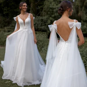 Romantic Big Bow V Back Wedding Dress Airy Tulle A Line Bridal Gown Spaghetti Strap Lace
