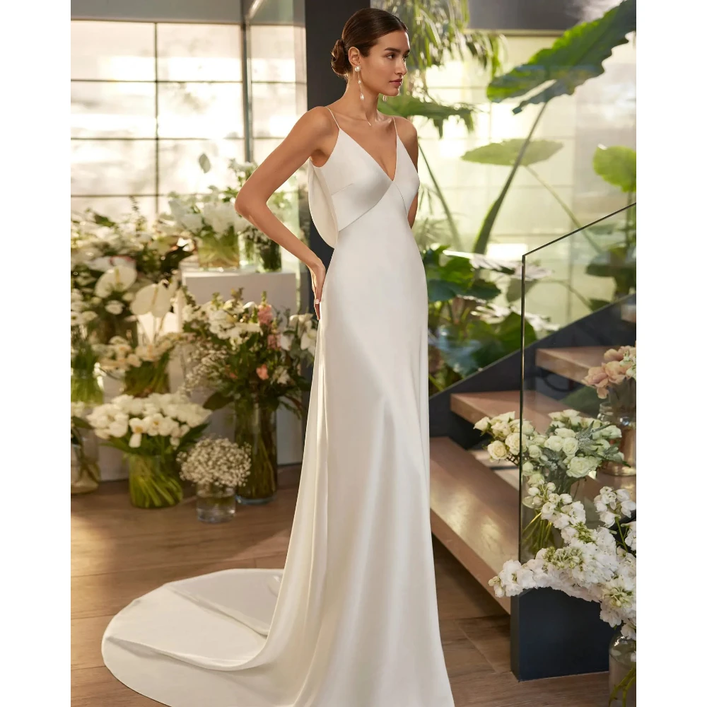 Elegant Ivory Mermaid Wedding Dress with Spaghetti Straps, V-Neck & Open Back