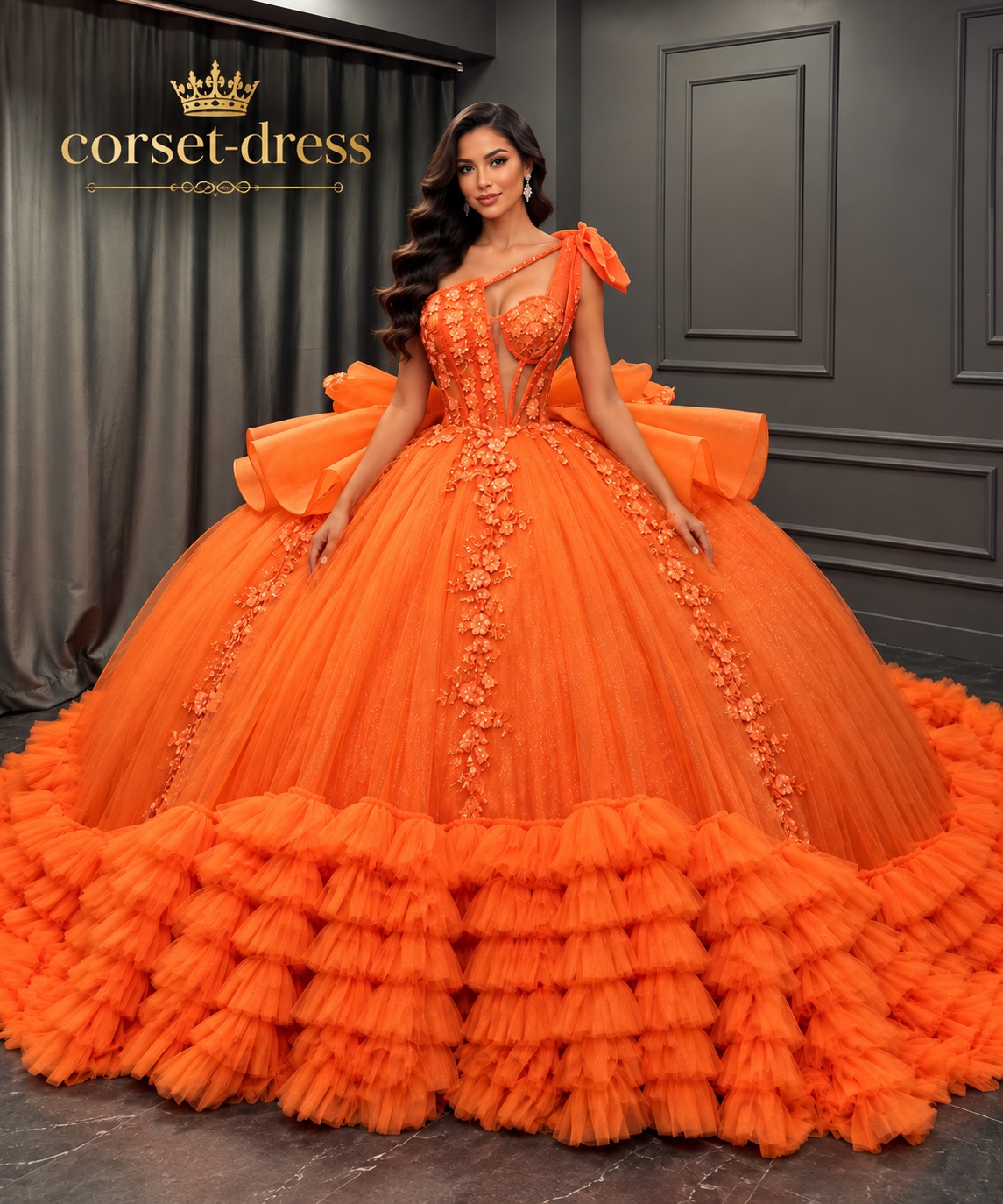 Orange corset ball gown with a voluminous ruffled skirt
