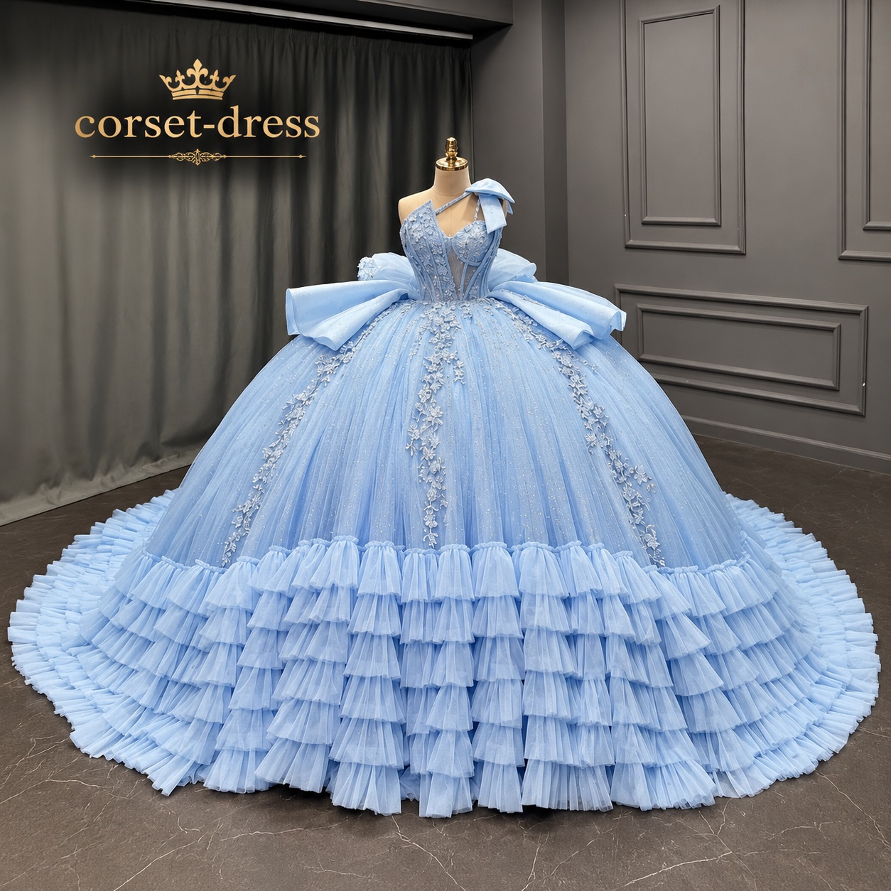 Icy blue couture ball gown with a voluminous skirt